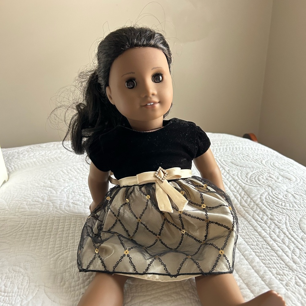 Elegant Black and Gold American girl doll